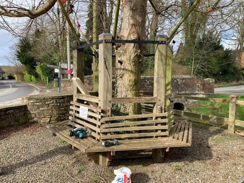 old arbor tree bench